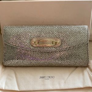 - Jimmy Choo champagne clutch with chain strap